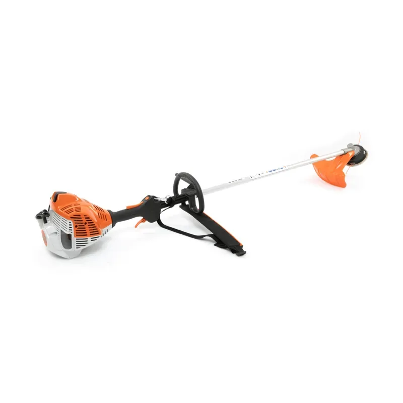 A clear-cut STIHL petrol line trimmer on a white background