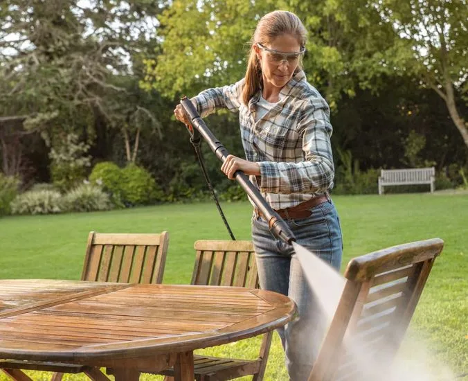 Pressure washing an outdoor timber chair
