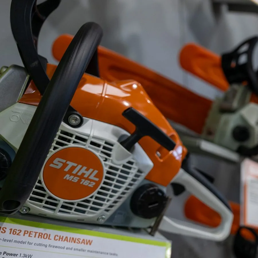 STIHL petrol chainsaws displayed on the showroom wall